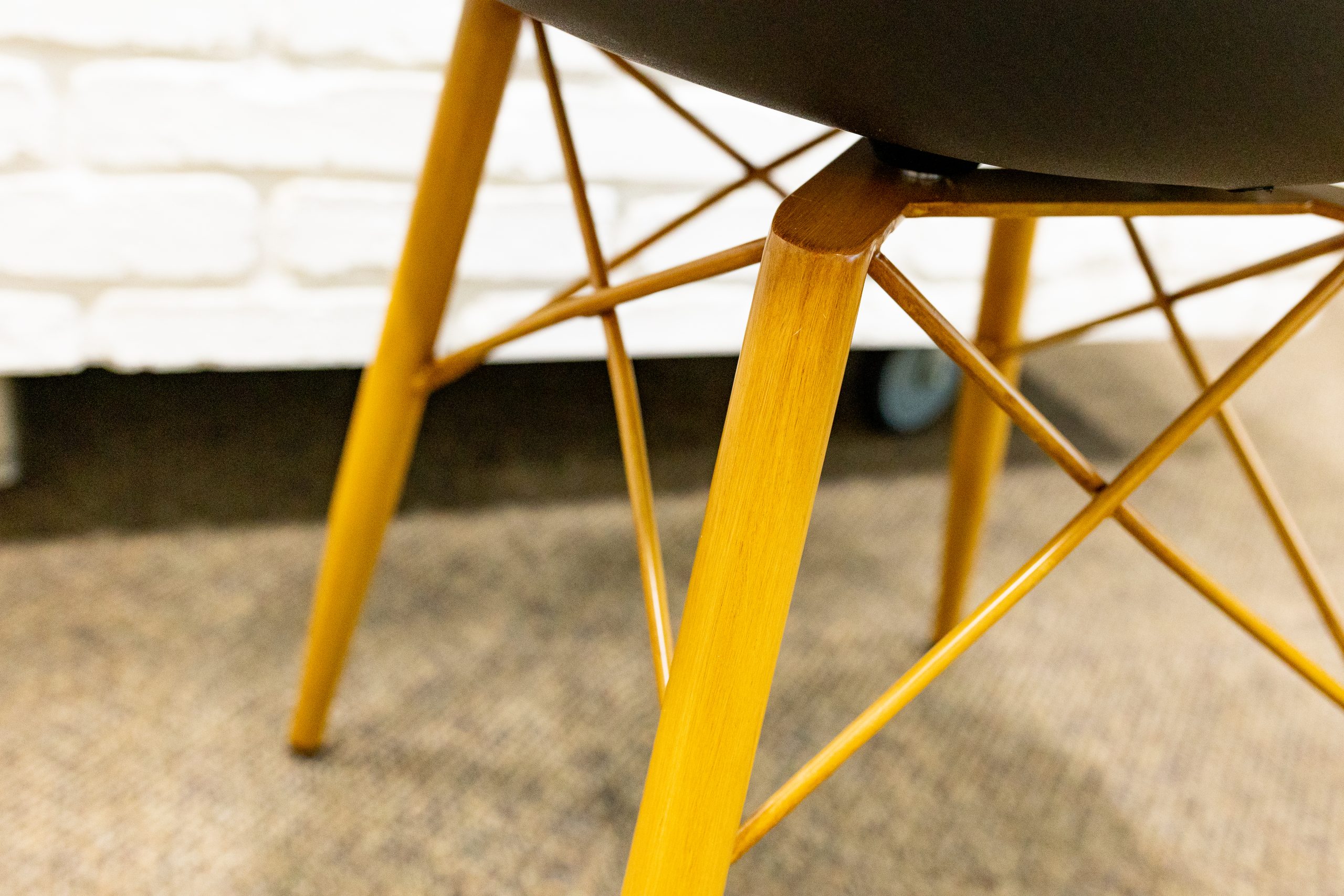 Close up photo of a contract-grade chair base that is fully welded
